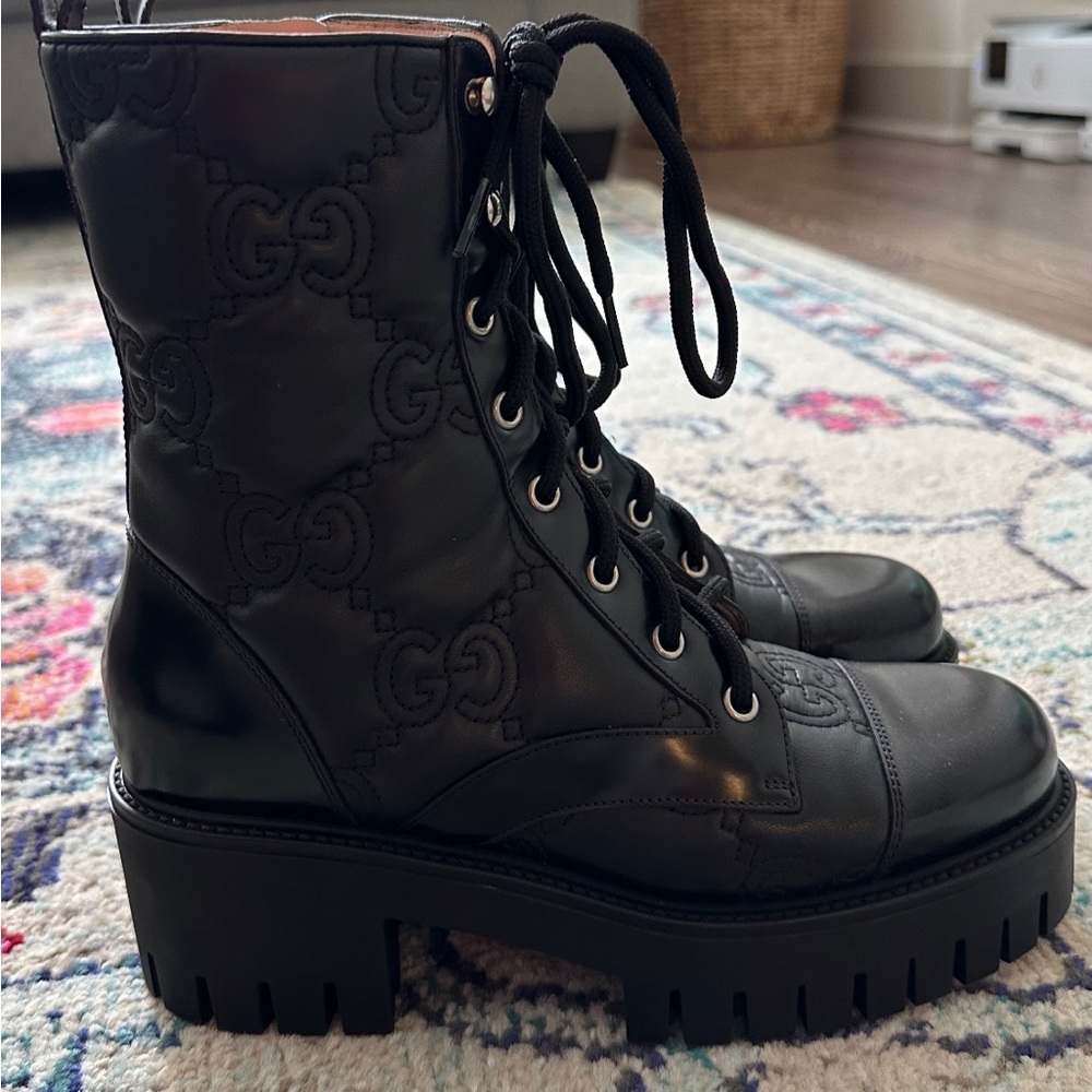 Brand new black Gucci boots. Size 7 were never worn.Serial #, See sales receipt.
